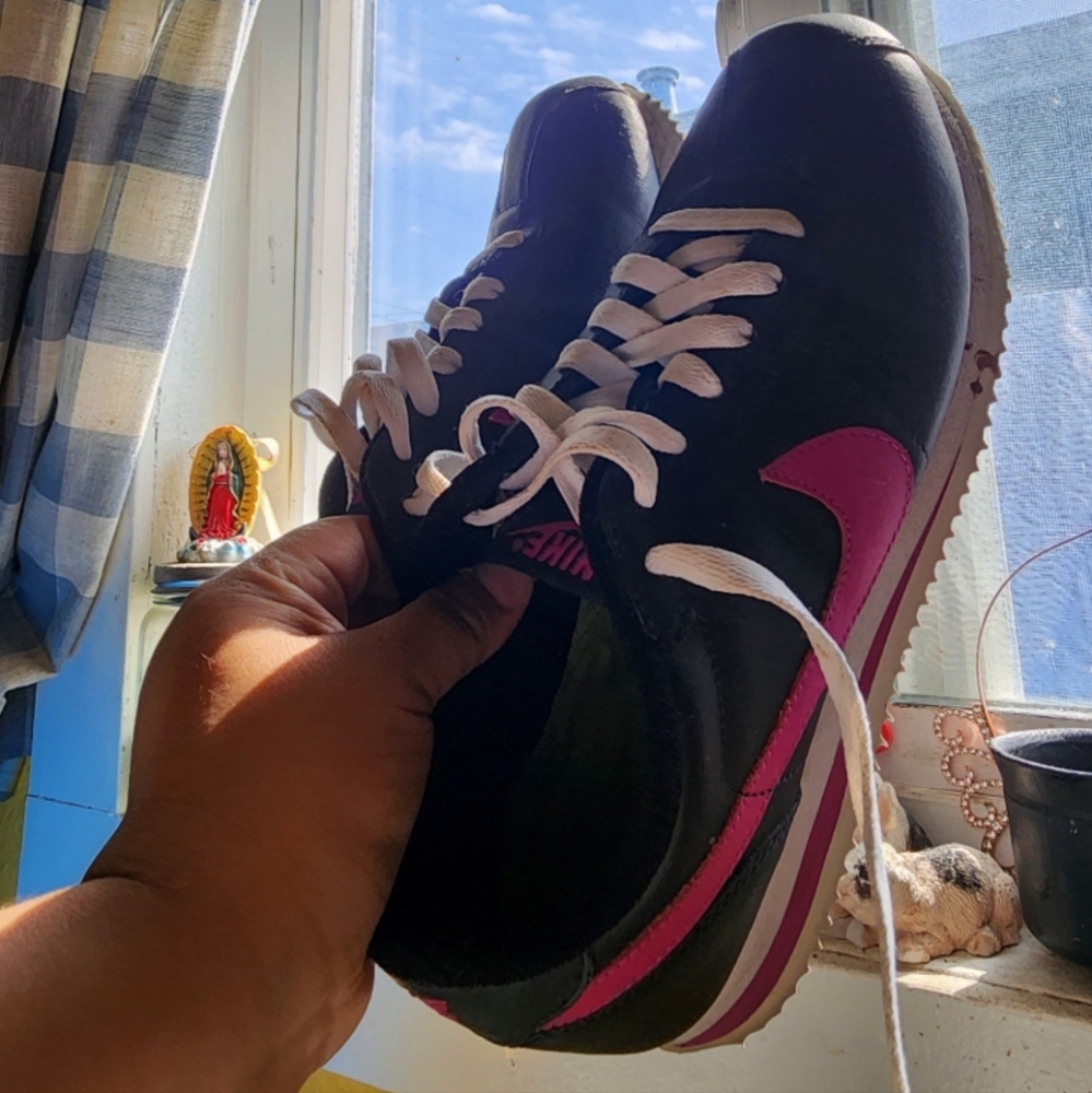 Black and pink cortez size 9